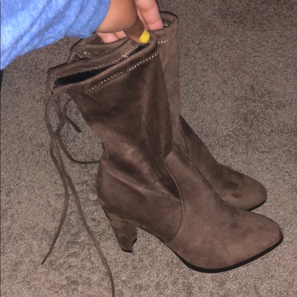 Brown suede booties that tie in back